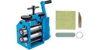 blue VEVOR jewelry rolling mill with crank handle, tools, and polishing cloth.