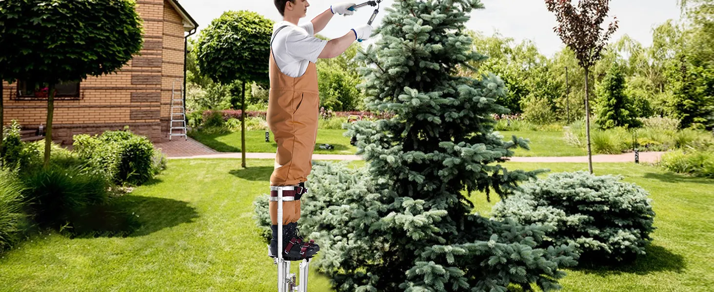 gardener on VEVOR drywall stilts trims tree branches in a lush green backyard.