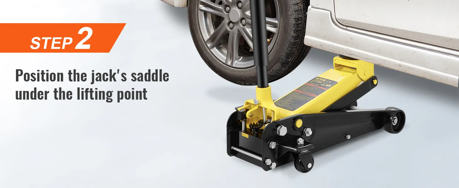 step 2: position the VEVOR floor jack's saddle under the lifting point of the car wheel.