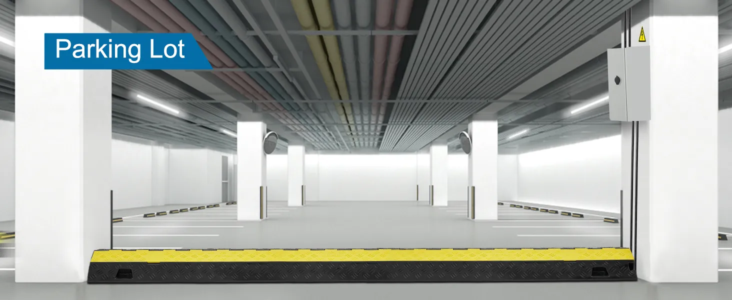VEVOR cable protector ramp in an underground parking lot with colorful overhead pipes.