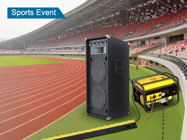 VEVOR cable protector ramp in a stadium setting for a sports event with speaker and generator.