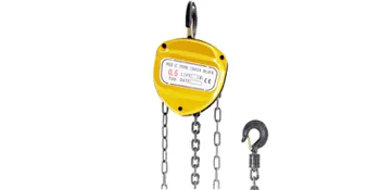 yellow VEVOR chain hoist with hook and chain, 0.5-ton capacity label visible
