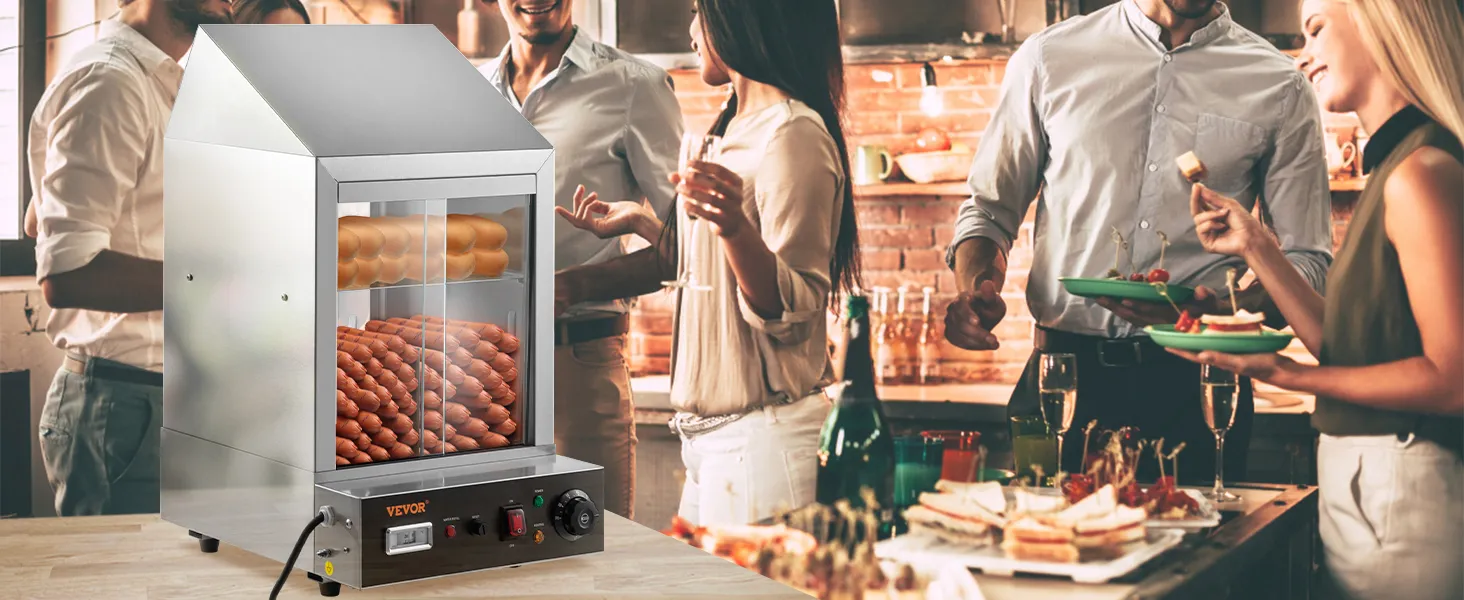 Vaporera de hot dogs VEVOR presentada en una reunión social con personas disfrutando de bocadillos y bebidas.