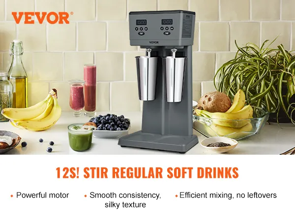 Máquina para hacer batidos VEVOR con dos vasos de acero inoxidable, batidos, frutas y bebidas en la encimera de la cocina.