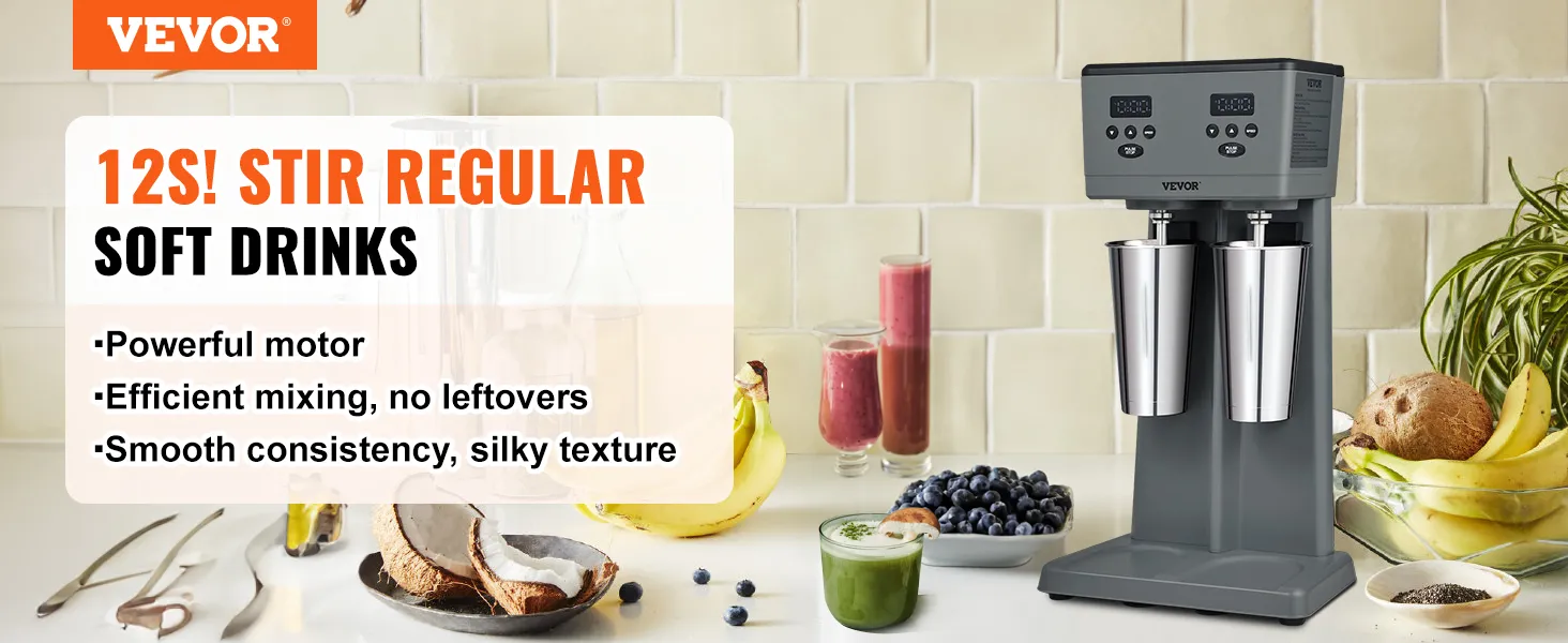 Máquina para hacer batidos VEVOR con dos vasos de acero inoxidable, batidos, frutas y bebidas en la encimera de la cocina.