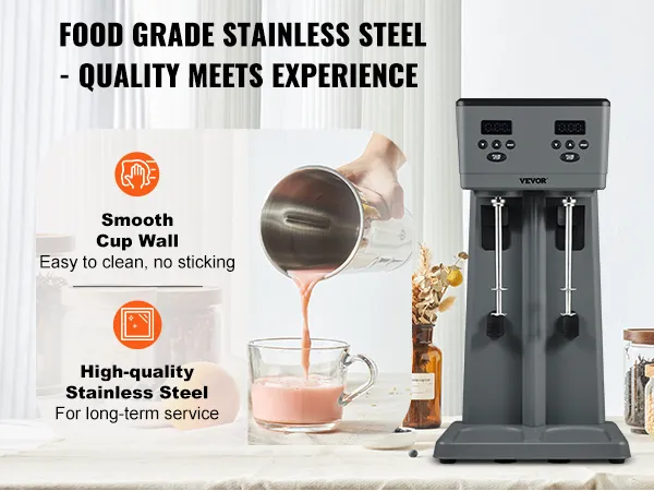 Máquina para hacer batidos VEVOR con dos tazas de acero inoxidable y un elegante diseño negro sobre la encimera de la cocina.