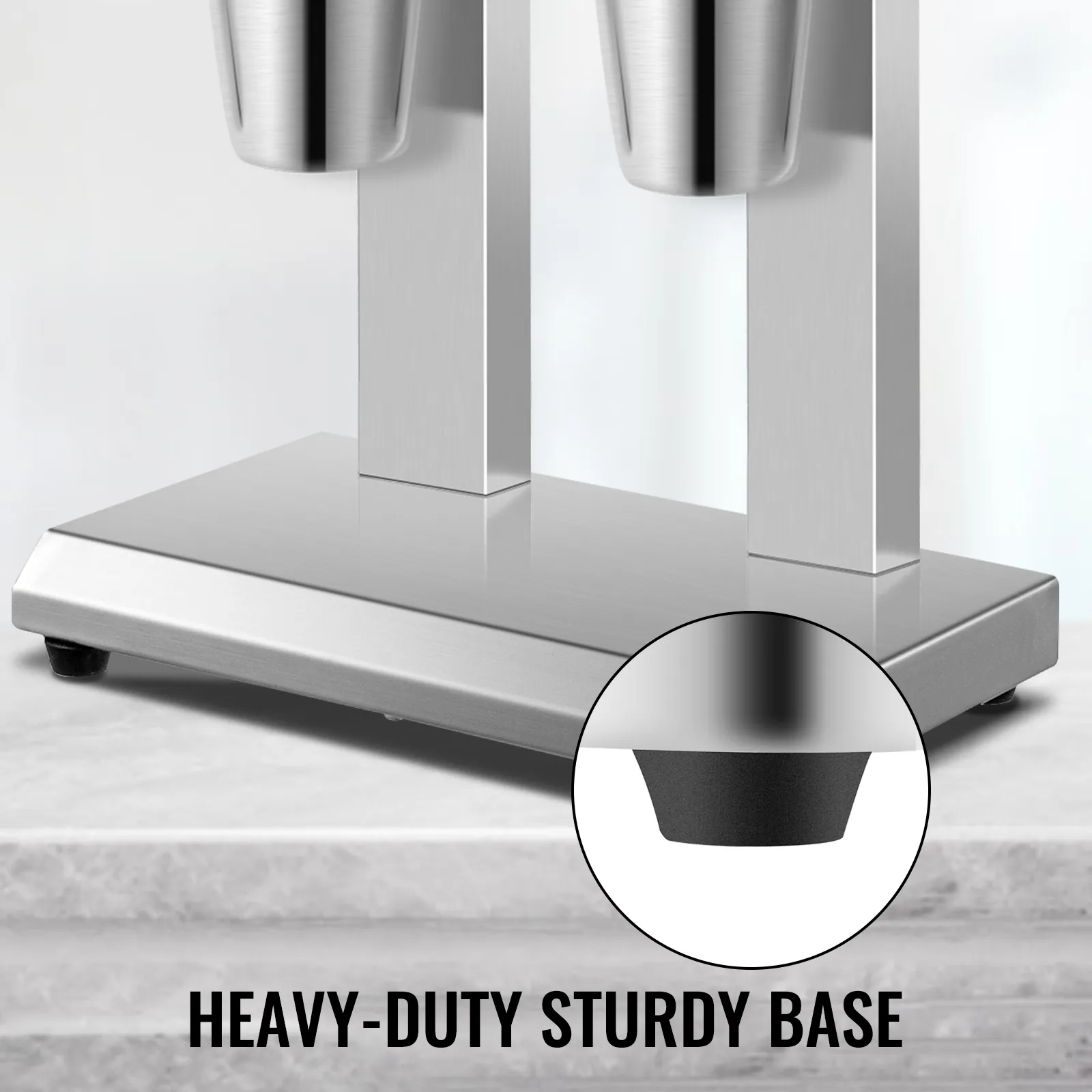 Máquina para hacer batidos VEVOR de acero inoxidable doble con una base resistente y robusta.