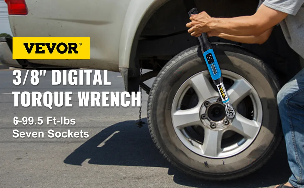 VEVOR digital torque wrench being used on a car wheel in a parking lot.