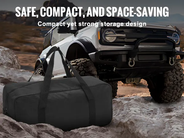 Bolsa de cuerda de remolque de recuperación cinética VEVOR sobre rocas con vehículo todoterreno, que promueve la seguridad y el almacenamiento compacto.