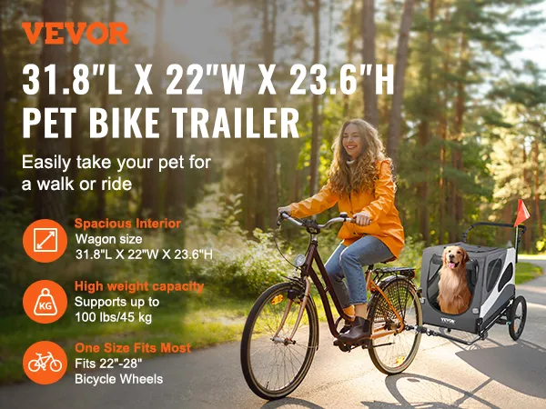 VEVOR dog bike trailer being pulled by a cyclist in a forest, showcasing its spacious interior.