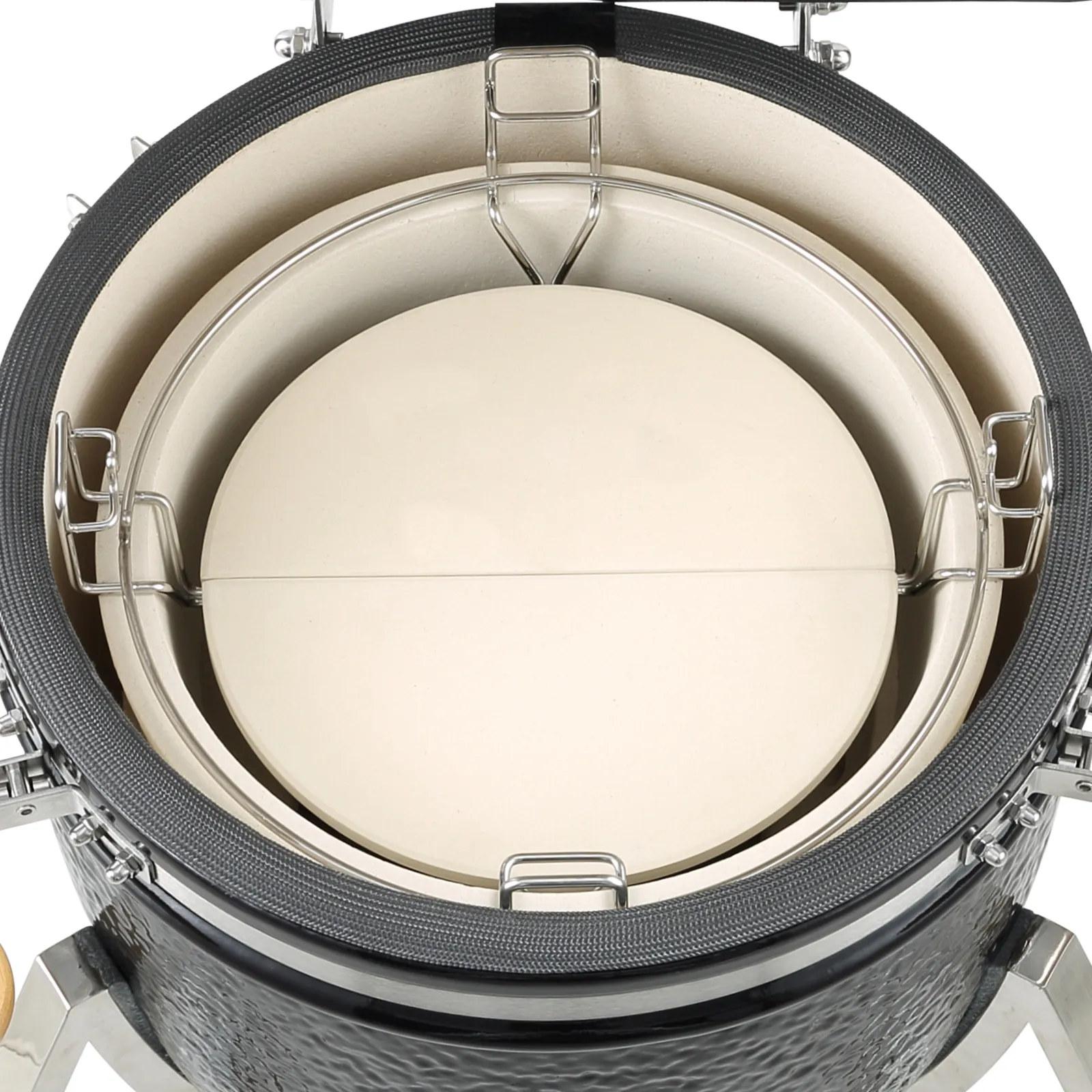 top view of an open VEVOR ceramic grill showing the inner cooking surfaces and metal grates.