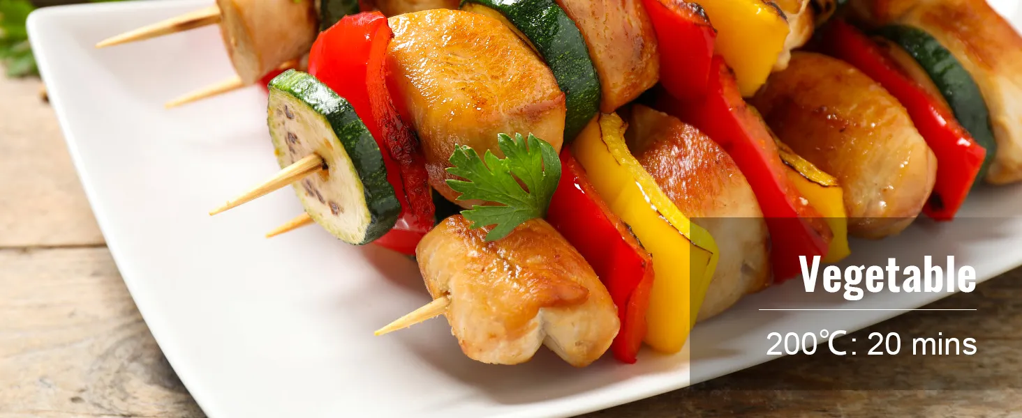 grilled vegetable skewers with zucchini, peppers, and chicken on a white plate, 200°c for 20 mins.
