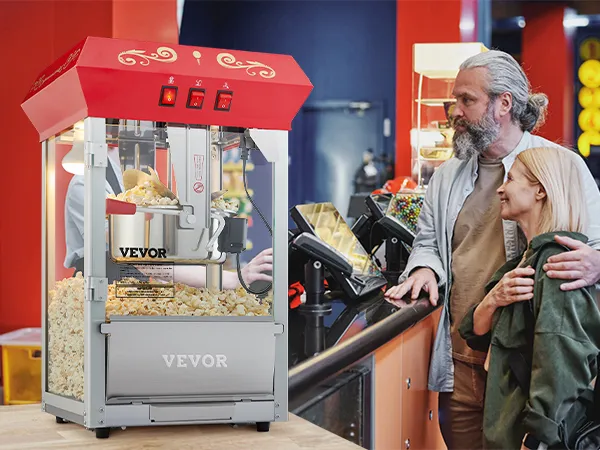 VEVOR popcorn popper machine at a concession stand, filled with popcorn, next to a couple ordering.