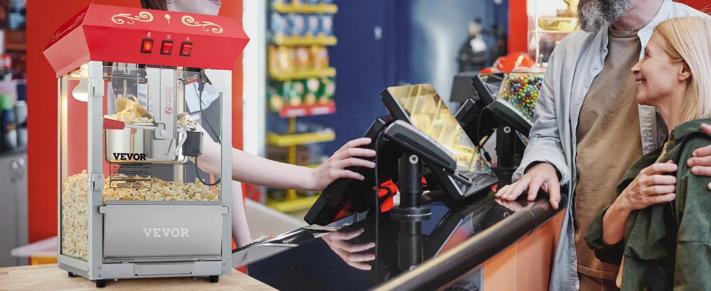 VEVOR popcorn popper machine at a concession stand, filled with popcorn, next to a couple ordering.