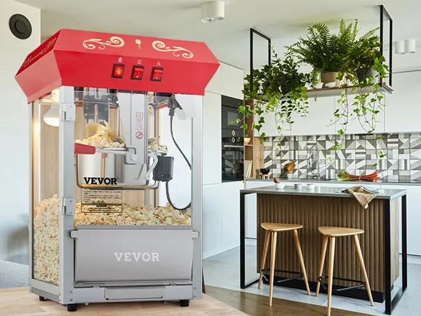 VEVOR popcorn popper machine in a modern kitchen with sleek cabinets and hanging plants.