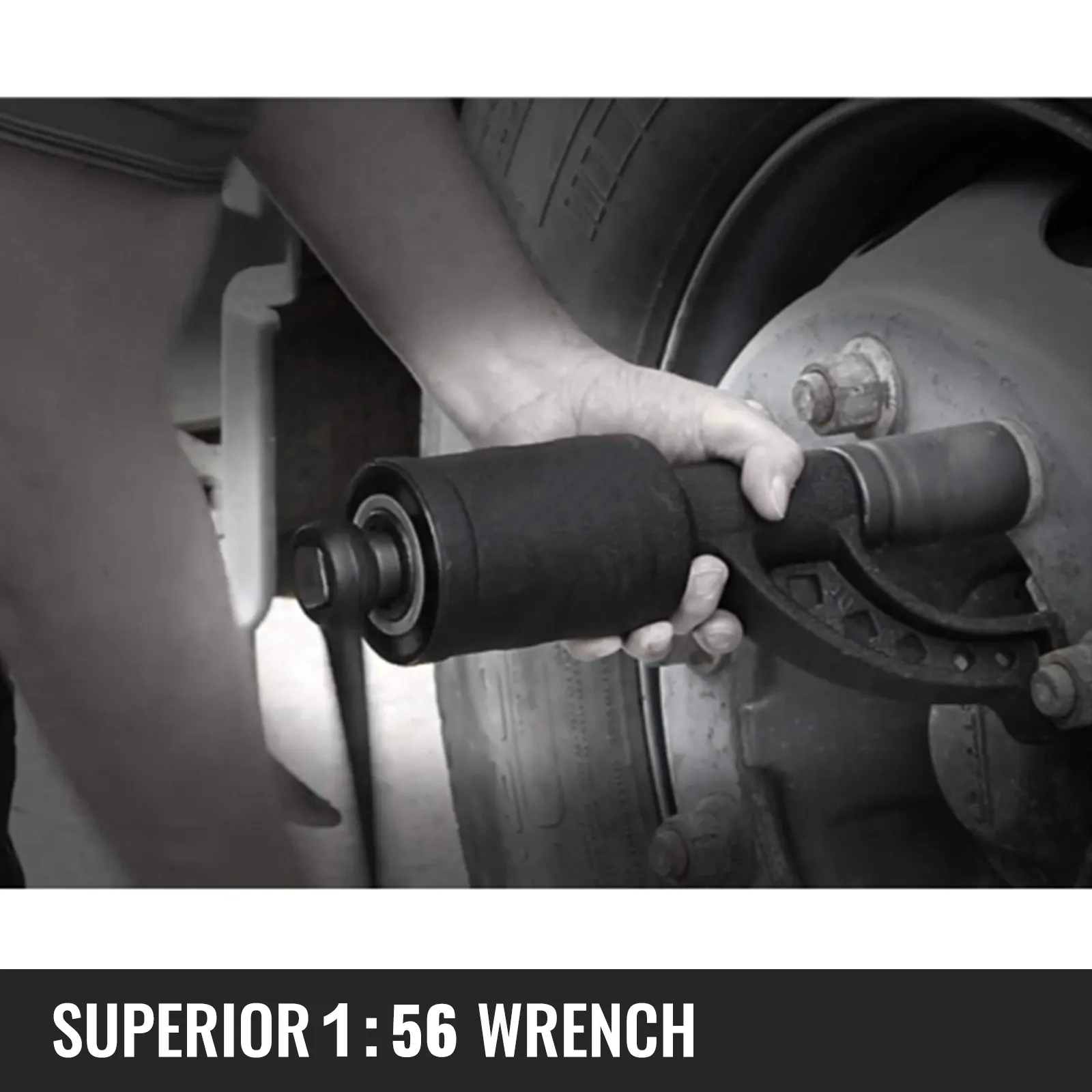 person using VEVOR torque multiplier wrench on a truck wheel lug nut.