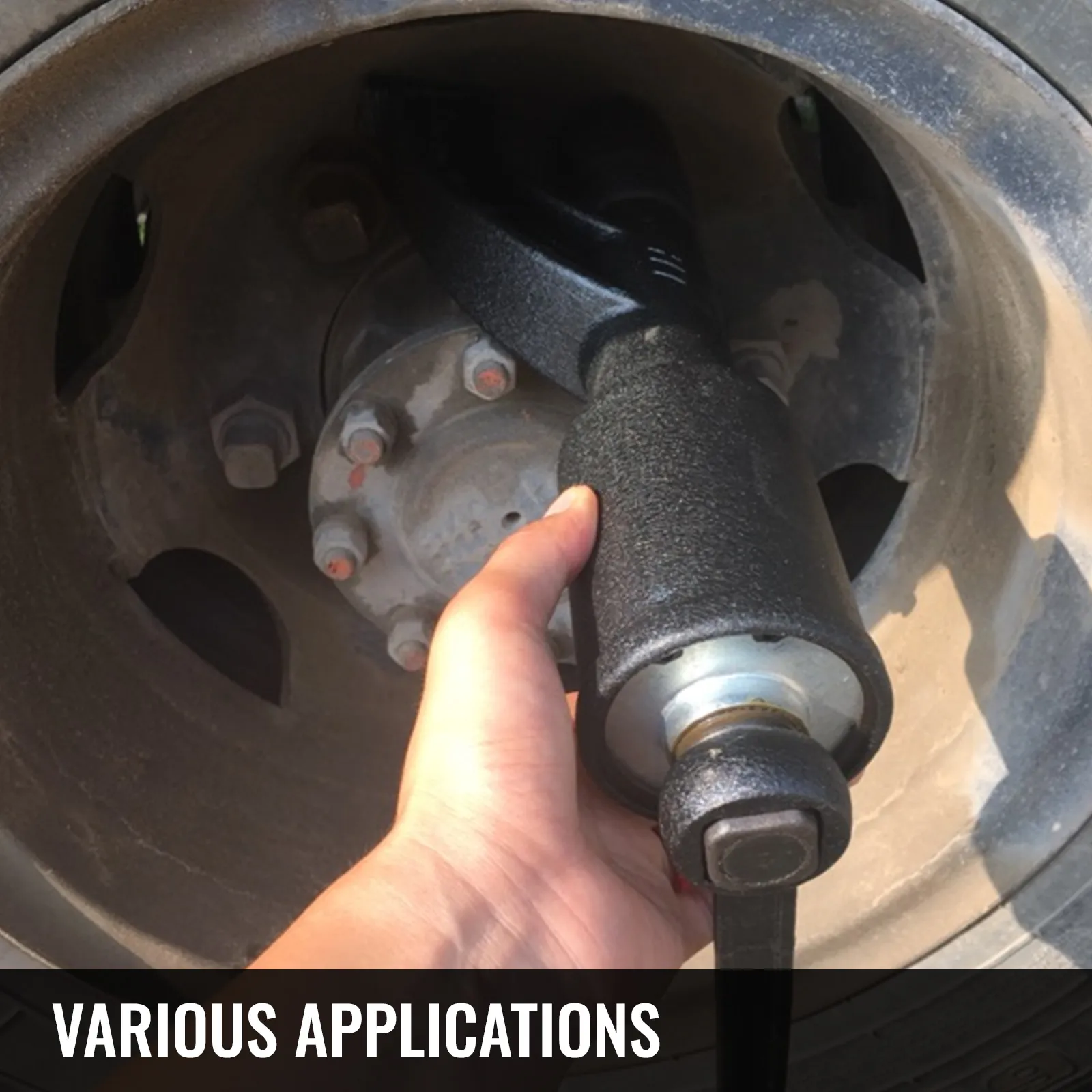 using VEVOR torque multiplier wrench on a truck wheel bolt.