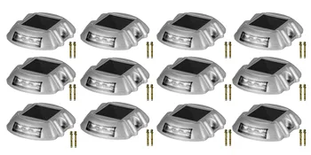 12 silver VEVOR solar driveway lights with mounting hardware arranged in a grid.