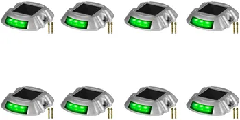 VEVOR solar driveway lights with green leds, arranged in an even row.