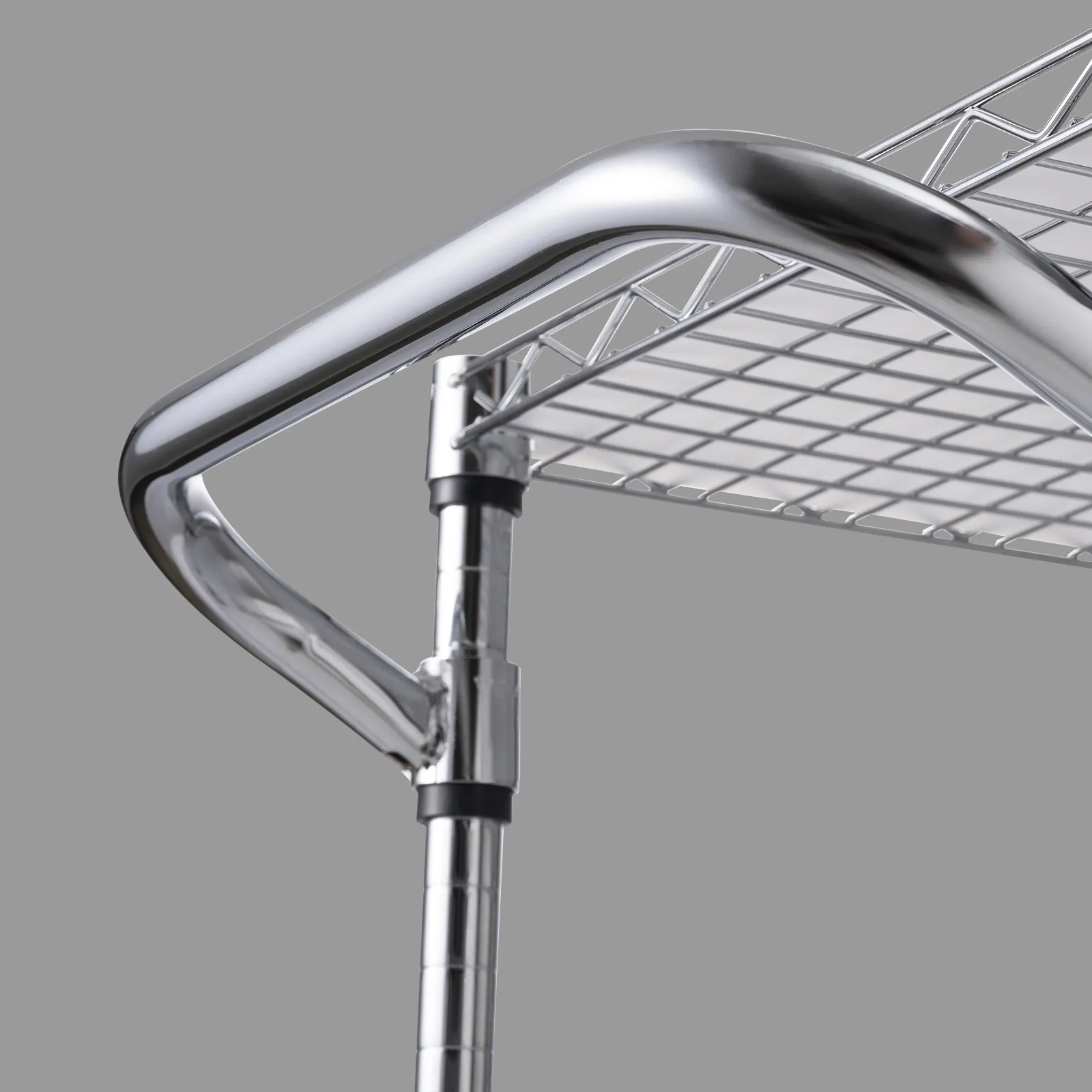 close-up of the top shelf of the VEVOR 3-tier utility cart with chrome finish and sturdy metal construction.