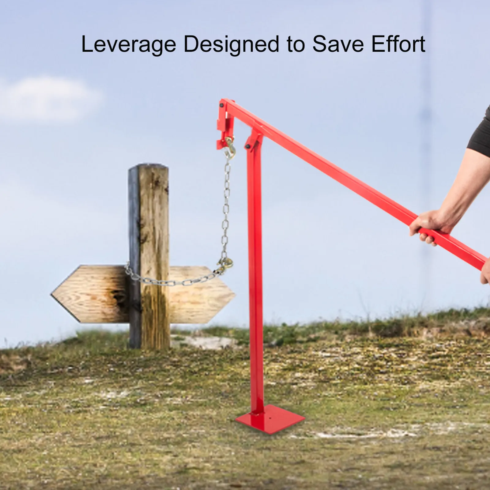 VEVOR t post puller removing a wooden post with a red leverage tool.