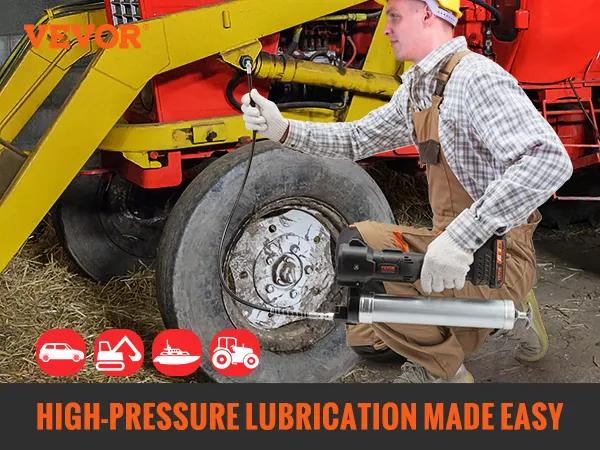 Pistola de engrase inalámbrica VEVOR utilizada para lubricación a alta presión en un vehículo agrícola en un granero.
