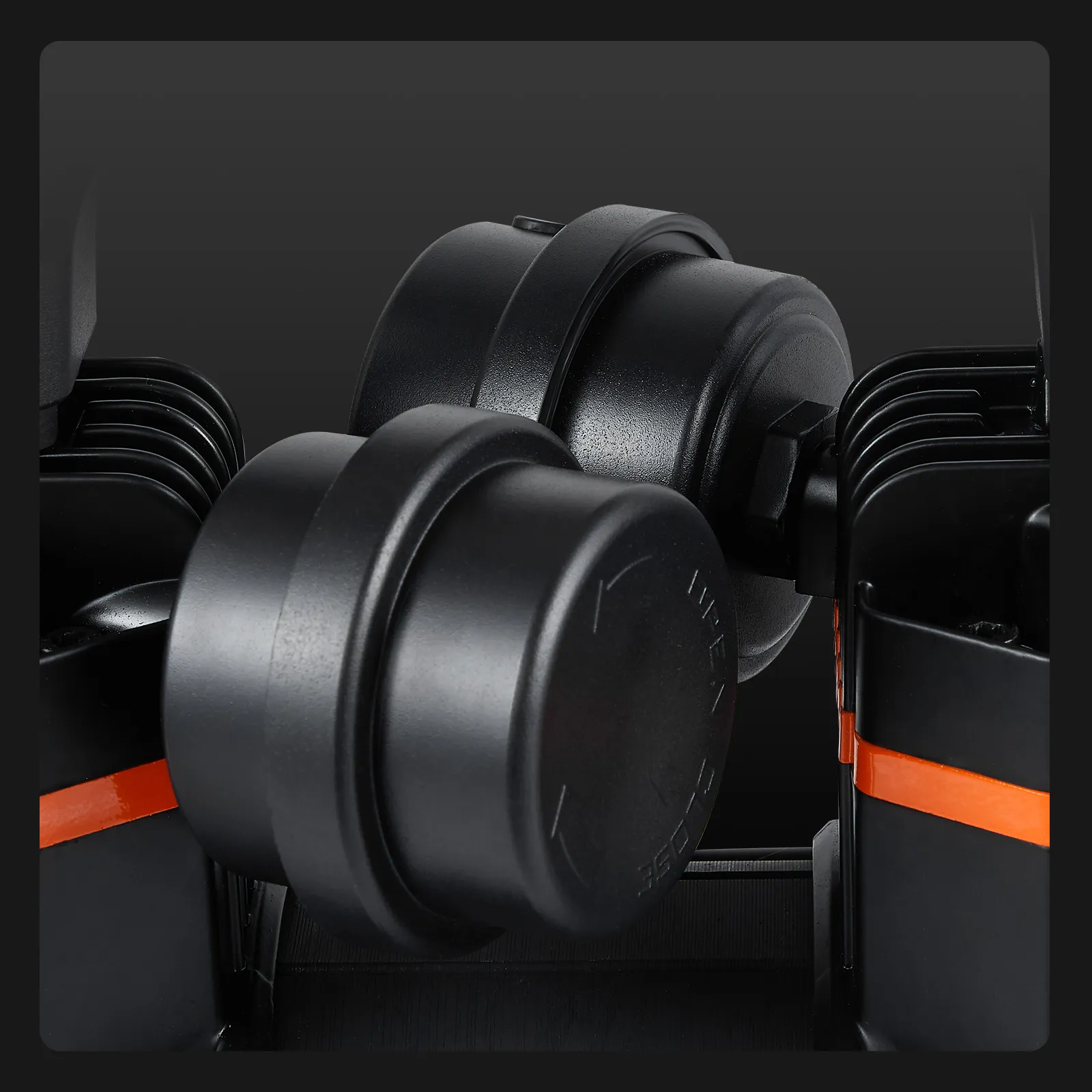 close-up of black dual motors on VEVOR ultra quiet air compressor against dark background.