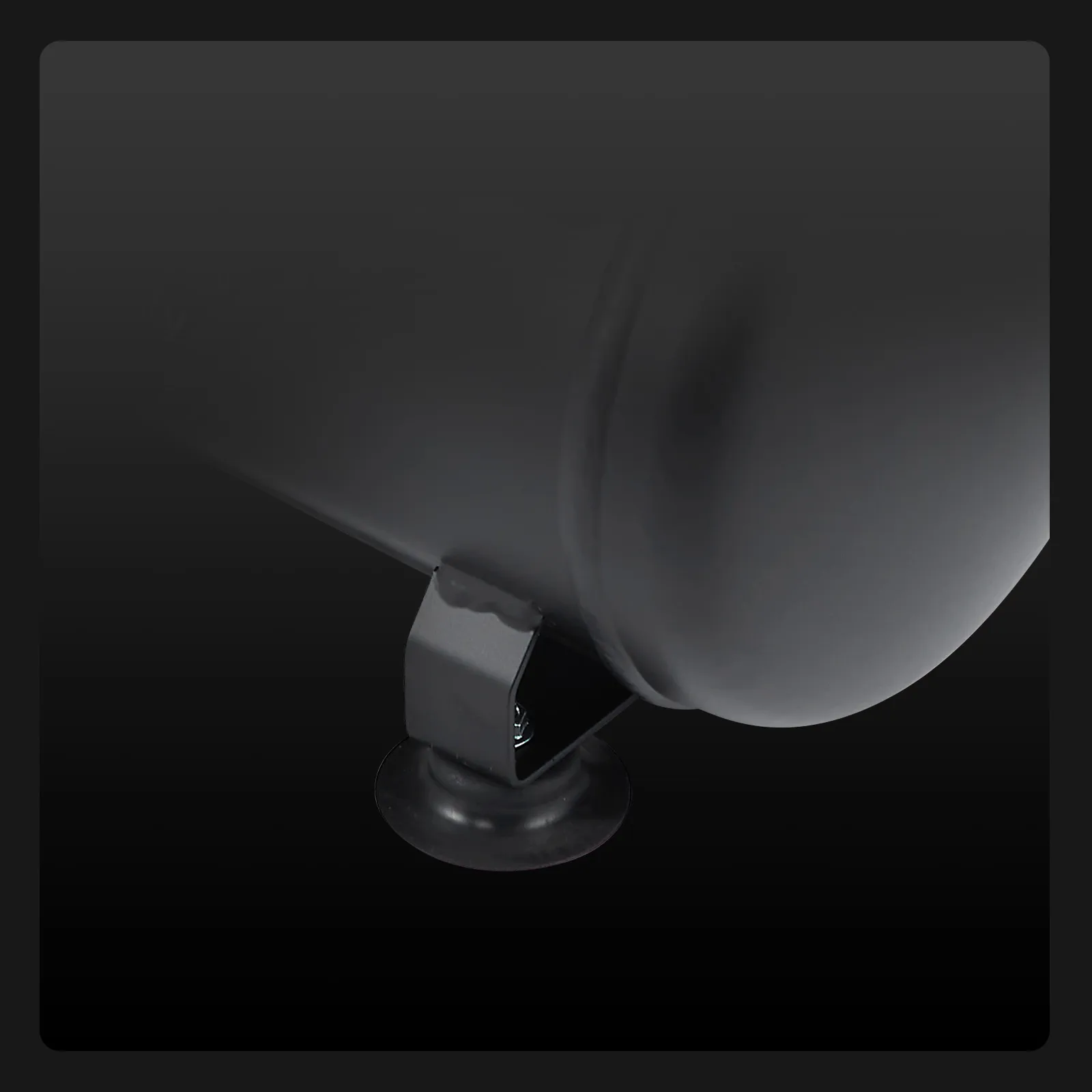 VEVOR ultra quiet air compressor base detail, sturdy rubber foot for stability on dark background.