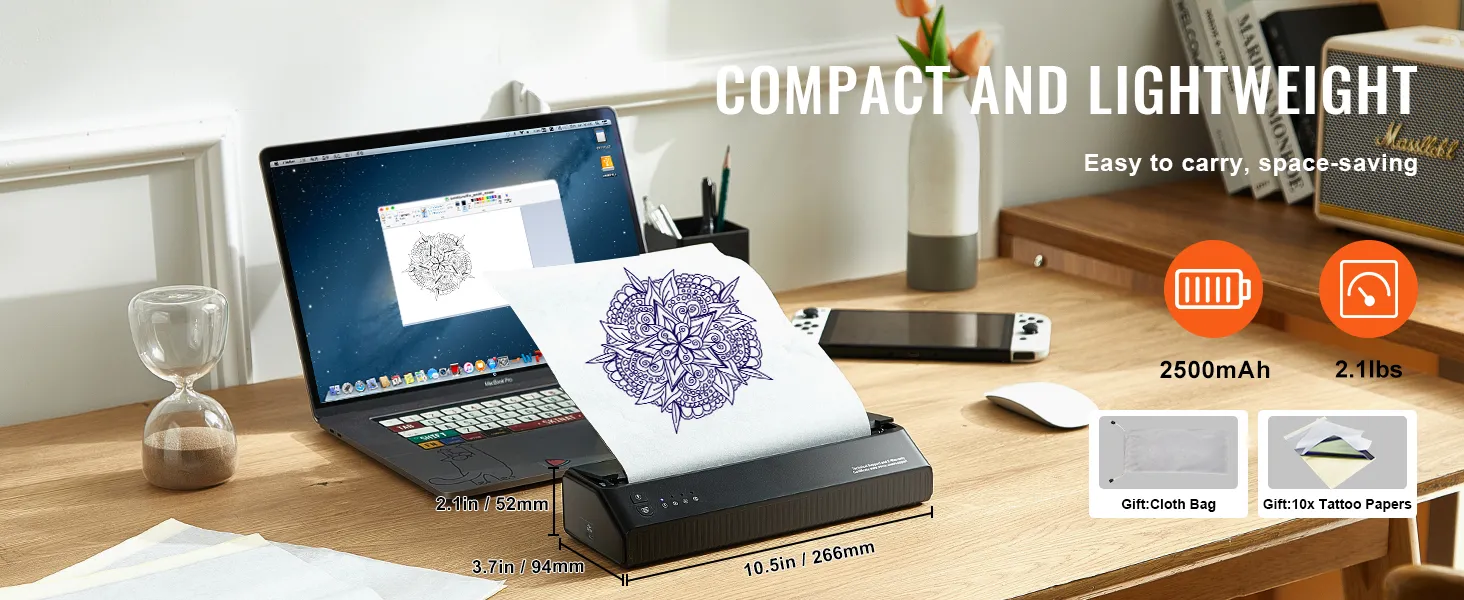 Stampante per stencil per tatuaggi VEVOR compatta e leggera da posizionare sulla scrivania insieme a un computer portatile, con disegno del tatuaggio pronto per la stampa.