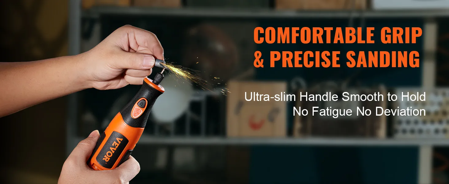hands holding the VEVOR rotary tool kit with comfortable grip, emitting sparks for precise sanding.