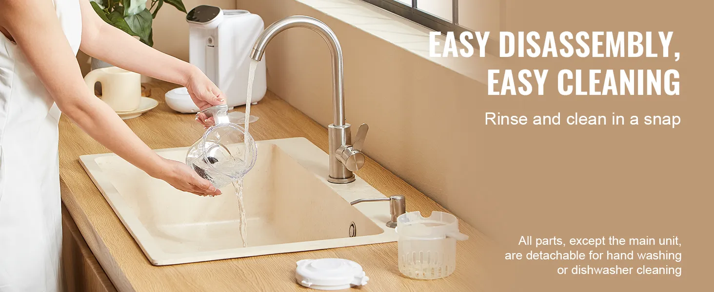 cleaning detachable parts of the VEVOR baby food maker under a faucet in a kitchen sink.