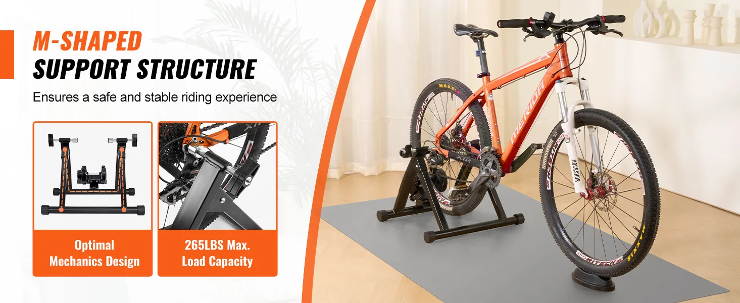 m-shaped VEVOR bike trainer stand with orange bike, 265 lbs load capacity, optimal mechanics design.