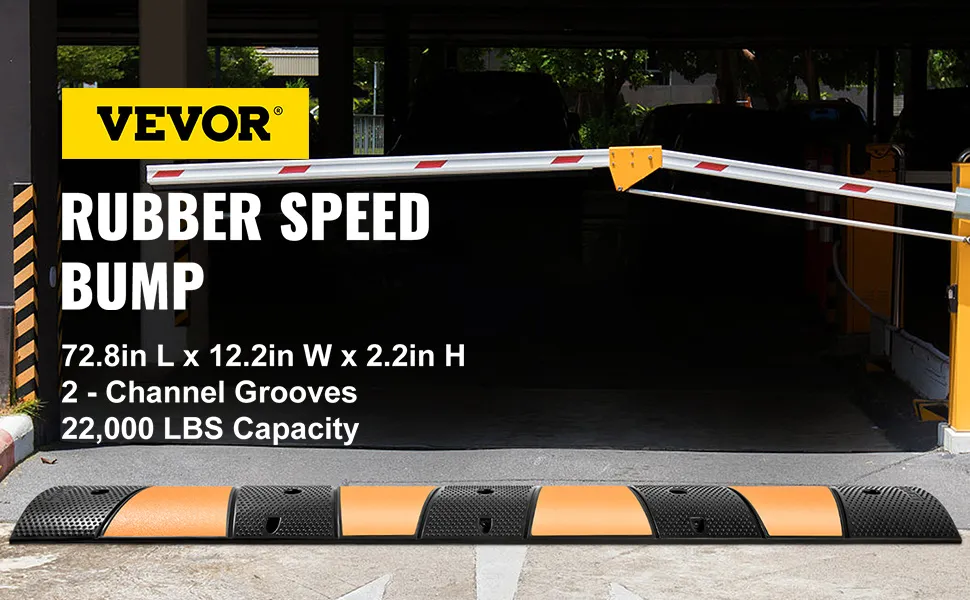 VEVOR rubber speed bump in front of a parking barrier gate.