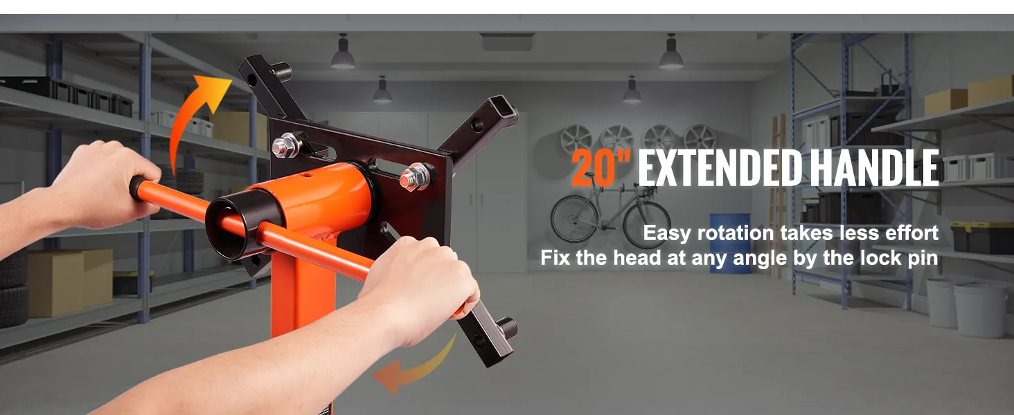 hands using a VEVOR engine stand with a 20" extended handle for easy rotation in a workshop.