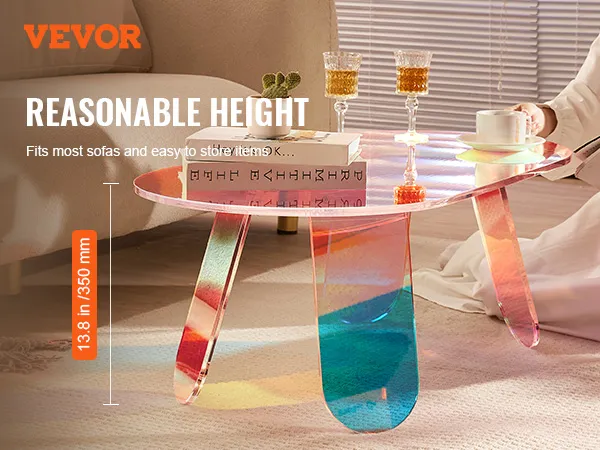 Mesa de centro de acrílico VEVOR en sala de estar con libros, tazas y ambiente confortable.