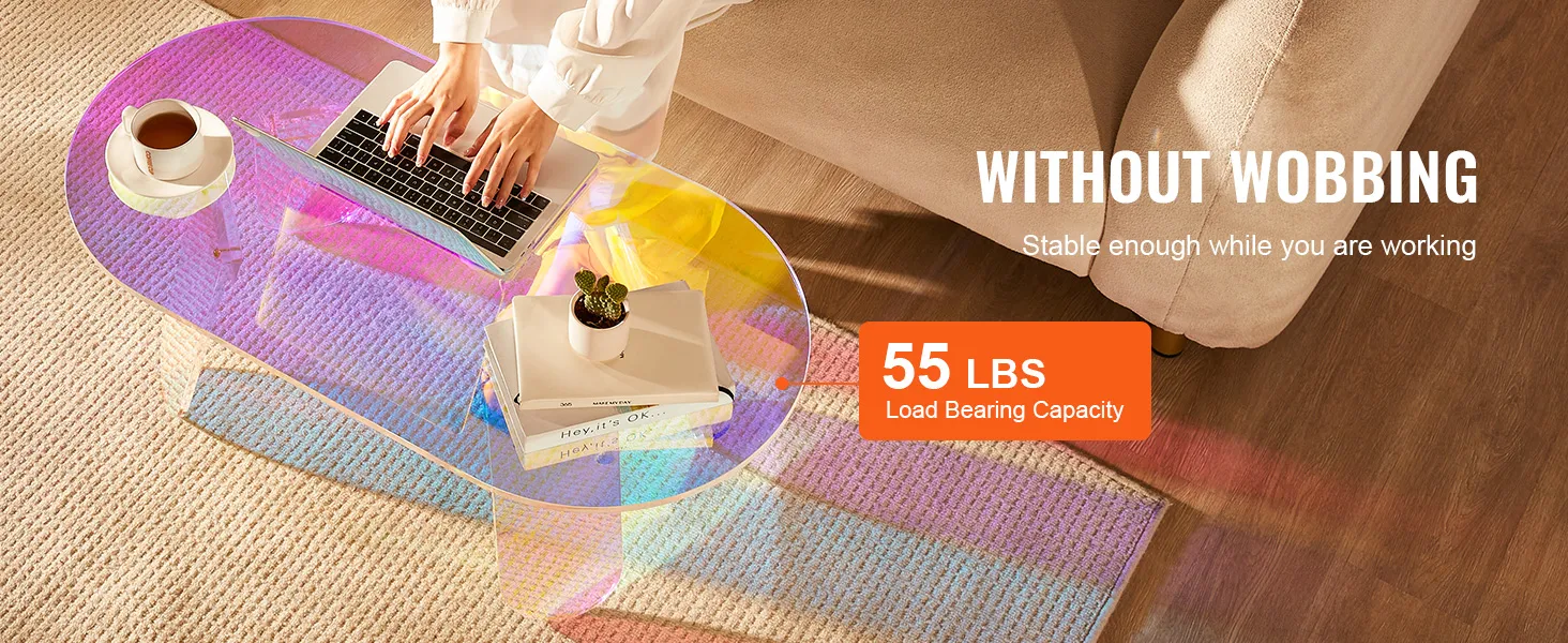 Mesa de centro de acrílico VEVOR con capacidad de carga de 55 libras, que presenta un diseño colorido en una acogedora sala de estar.