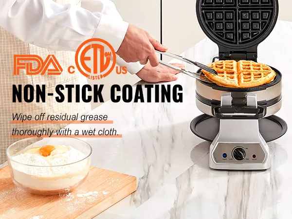 Persona que utiliza una máquina para hacer waffles VEVOR con revestimiento antiadherente; cerca hay waffles, tomates y leche en la encimera.
