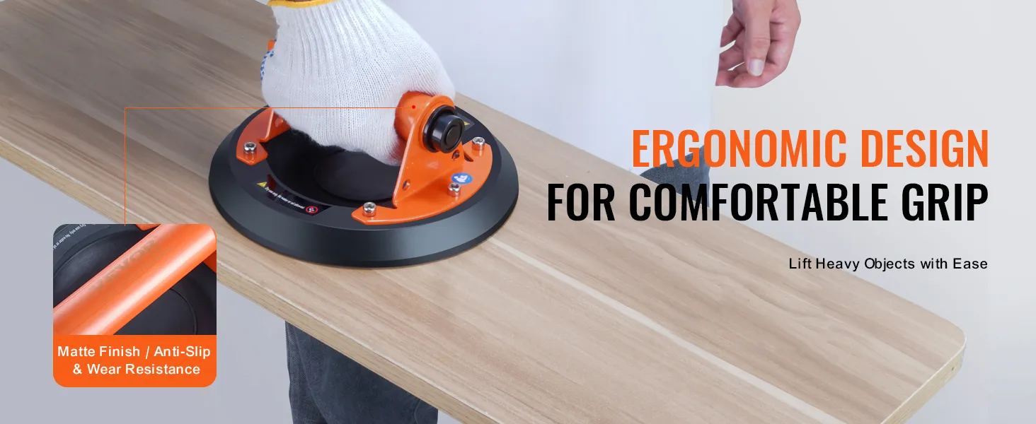 person using VEVOR glass suction cup to lift a wooden board, showcasing ergonomic design and a matte finish.