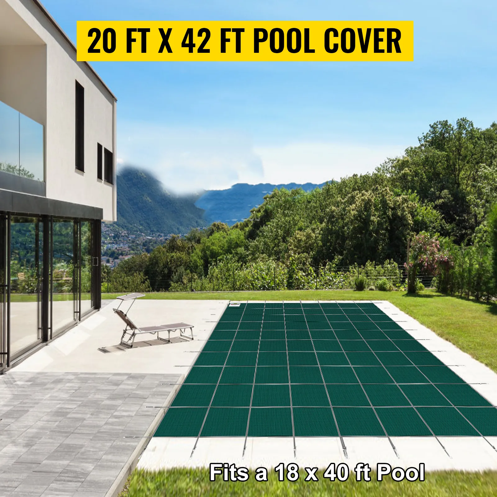 modern home patio with a VEVOR inground pool safety cover installed in a lush green backyard.