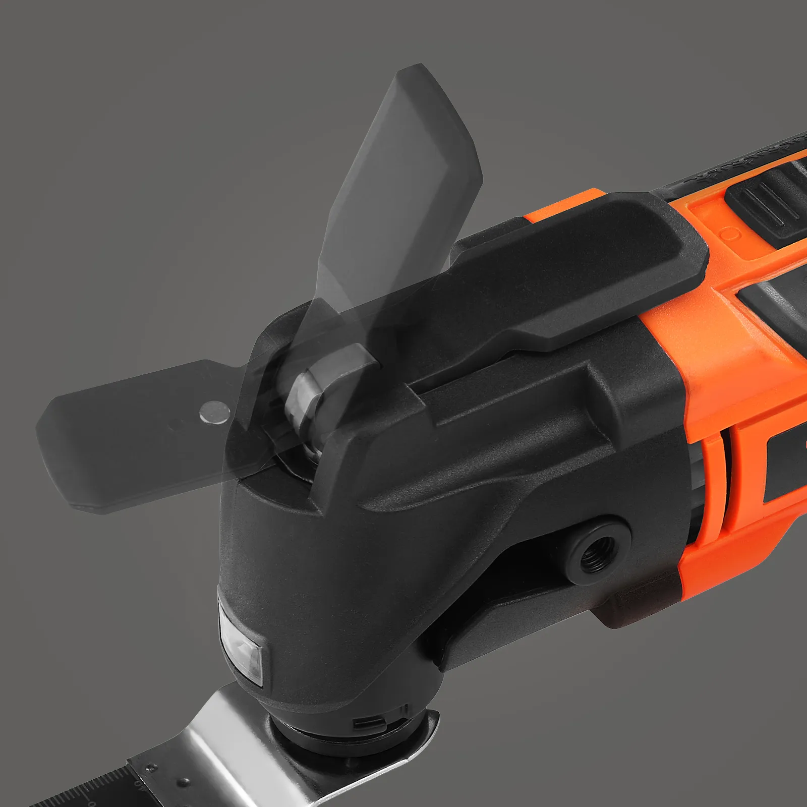 close-up detail of a VEVOR oscillating tool blade attachment and adjustment knob against a gray background.