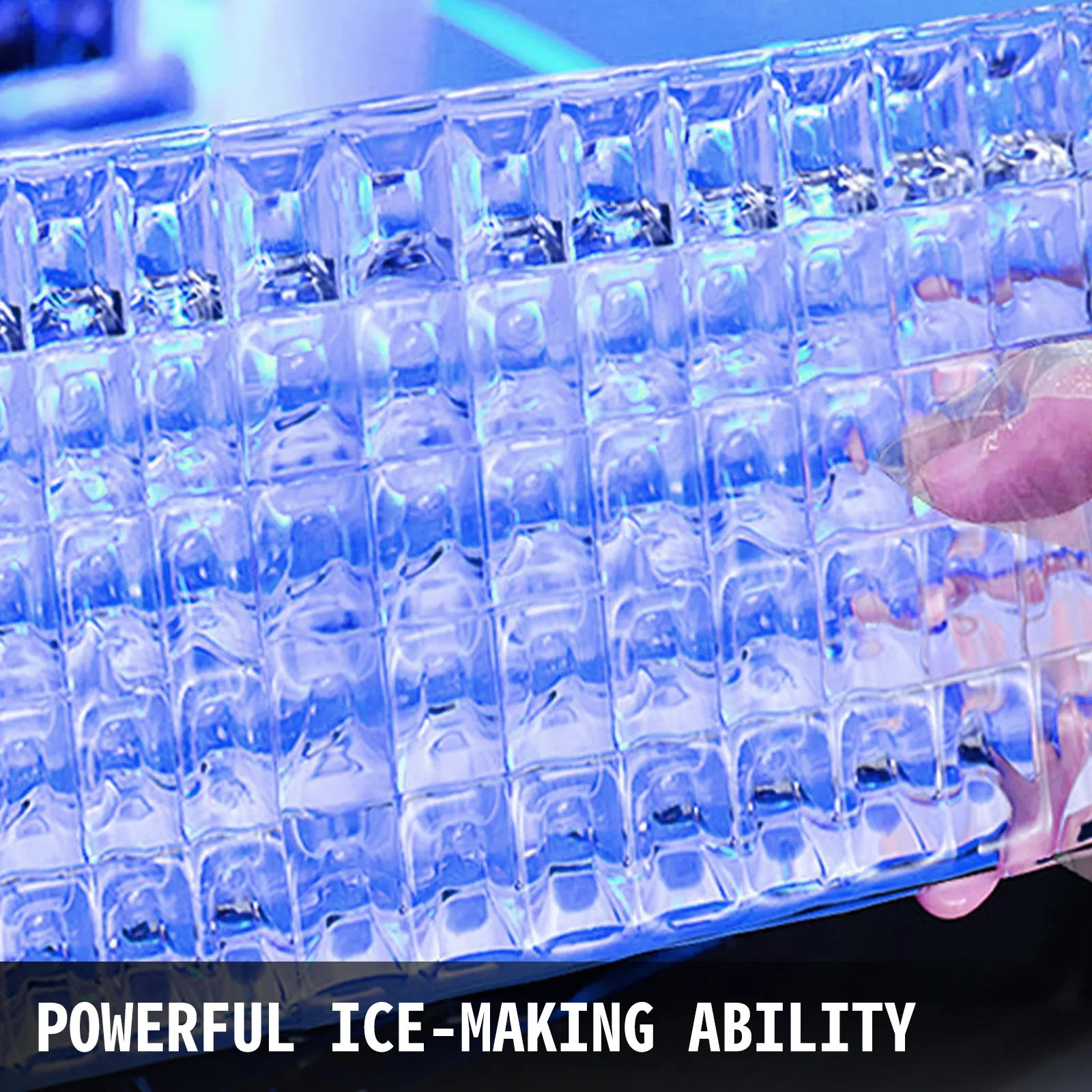 Bandeja de hielo de la máquina de hielo comercial VEVOR, que muestra cubitos de hielo transparentes.