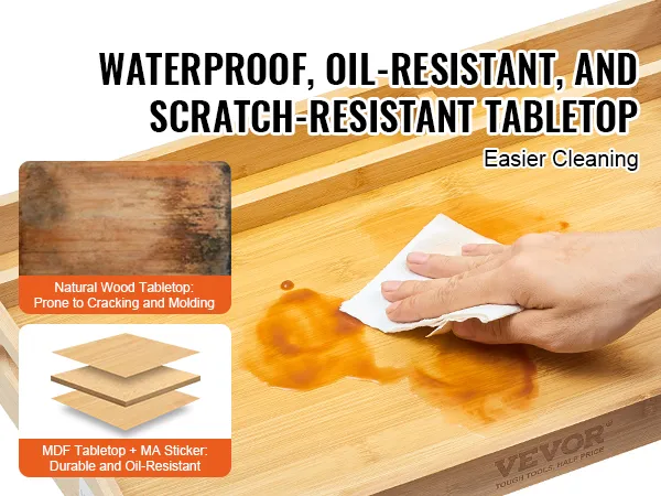 Mit der Hand wischt man verschüttete Flüssigkeit auf dem VEVOR-Betttabletttisch ab und zeigt dabei seine wasserdichte, ölbeständige und kratzfeste Tischplatte.