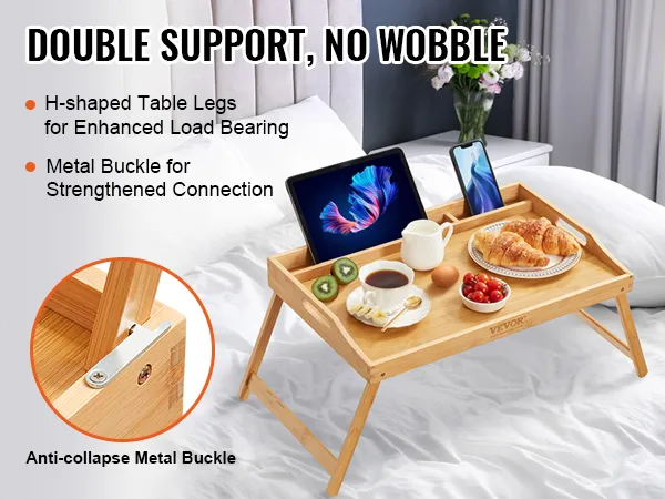 VEVOR-Betttabletttisch auf einem Bett mit Frühstück, Tablets und einem Telefon, mit stabilen H-förmigen Beinen.