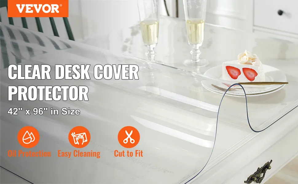 VEVOR clear table cover on white desk with cake, cutlery, and champagne.