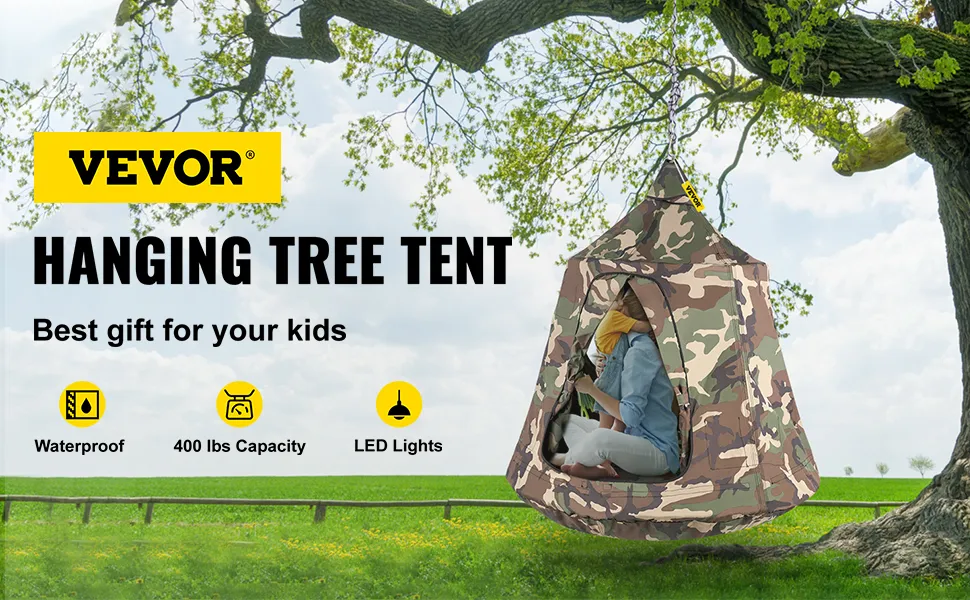 Tienda de árbol colgante VEVOR con patrón de camuflaje que cuelga de un árbol verde.