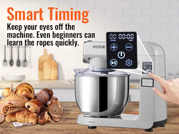VEVOR stand mixer with a digital display and various baked goods on a wooden kitchen counter.