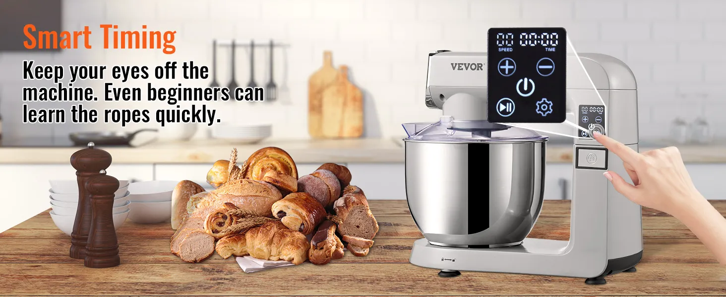 VEVOR stand mixer with a digital display and various baked goods on a wooden kitchen counter.