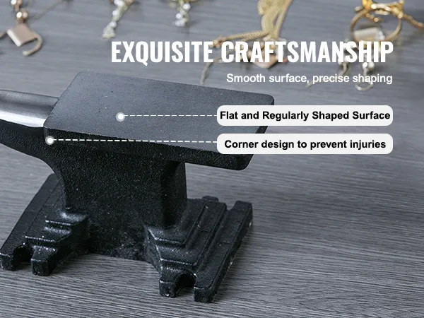 VEVOR anvil with smooth surface and rounded corners on a grey workbench, surrounded by jewelry tools.