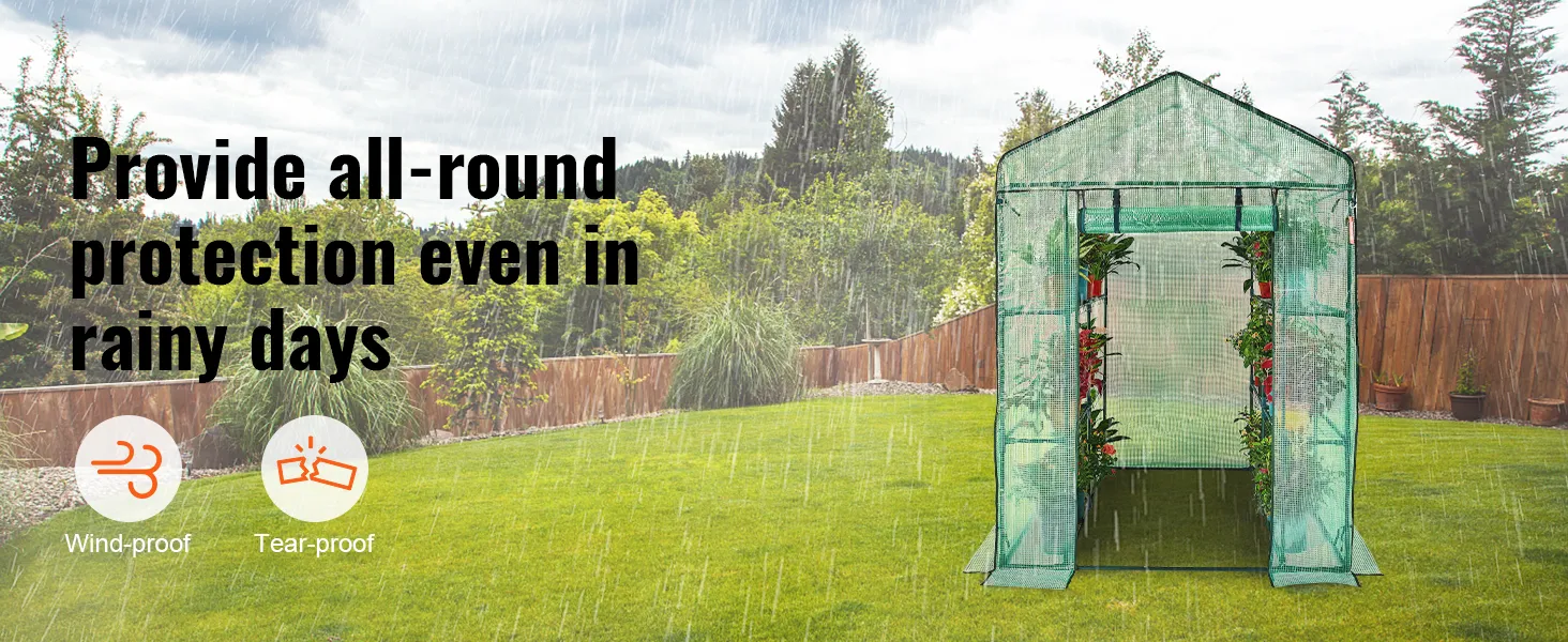 VEVOR walk-in greenhouse in a rainy backyard, promoting wind-proof and tear-proof features.