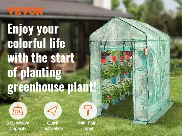 VEVOR walk-in greenhouse with shelves filled with colorful potted plants in a garden setting.